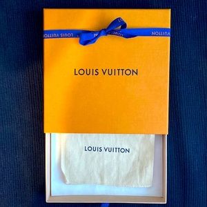 Louis Vuitton storage box & protective bag.